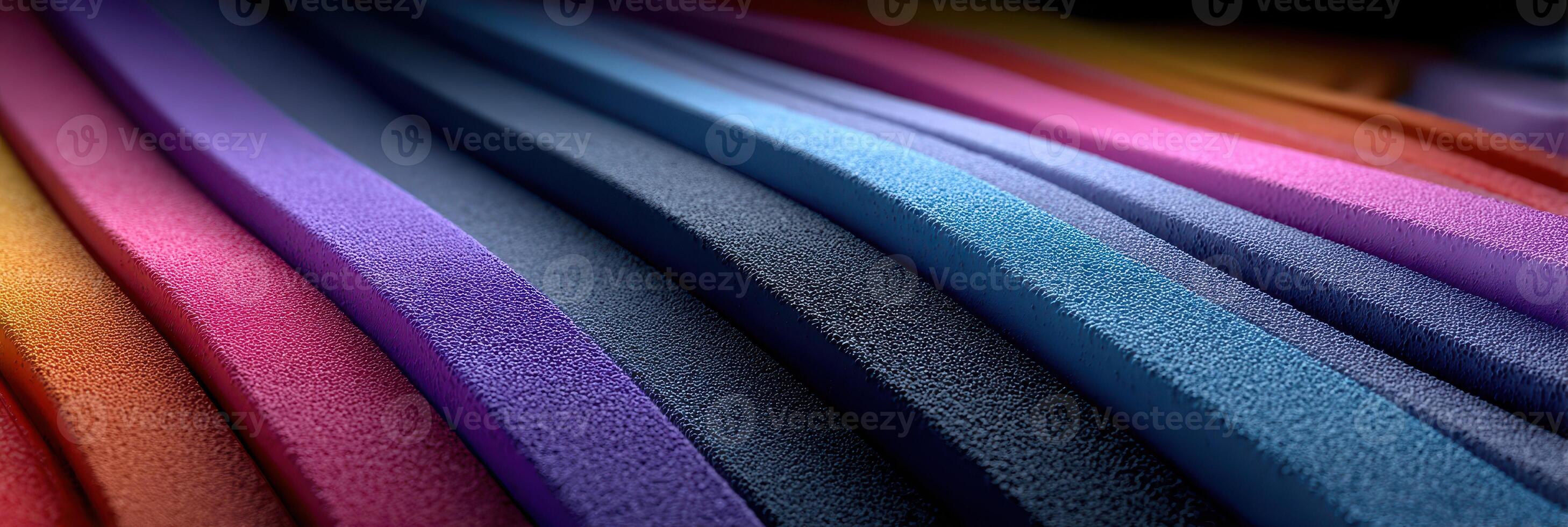 Colorful layers of textured fabric arranged in a vibrant display showcasing creativity and material design photo