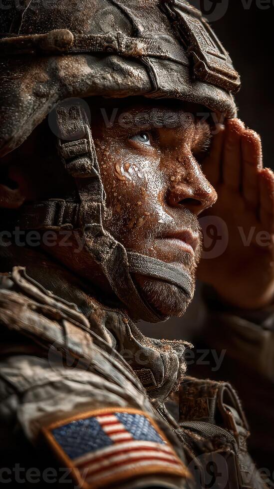 Soldier in tactical gear salutes with determination during a military drill at sunrise photo