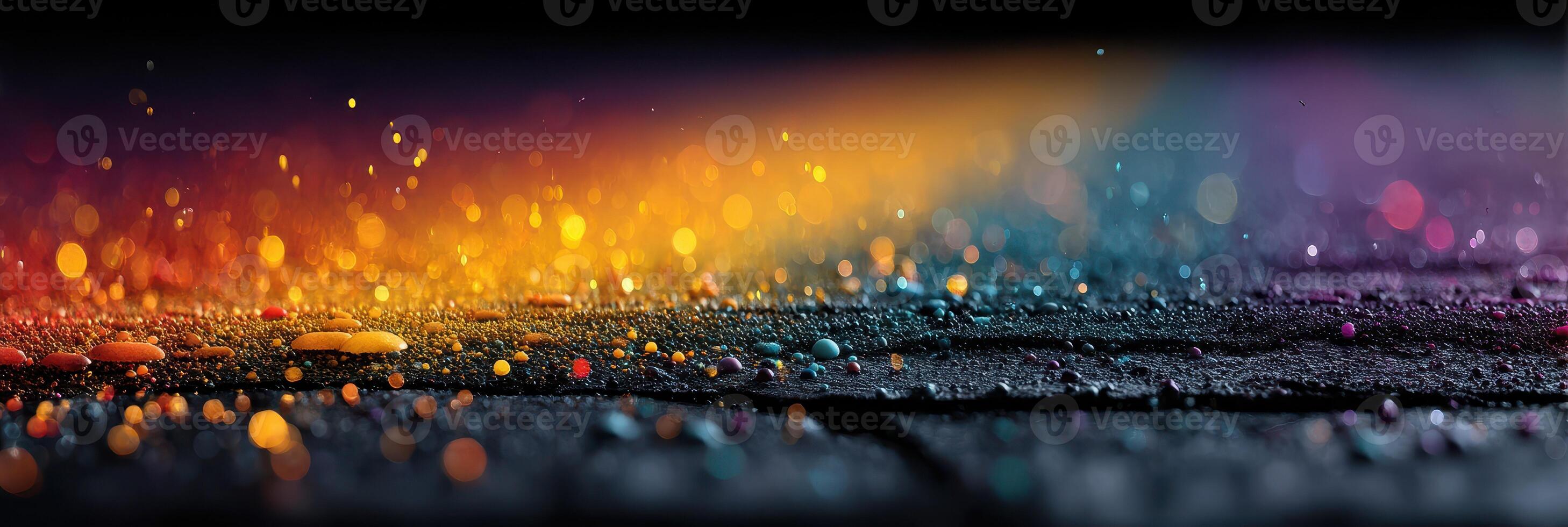 Colorful bokeh lights reflecting on wet pavement after rain during twilight hours in an urban environment photo