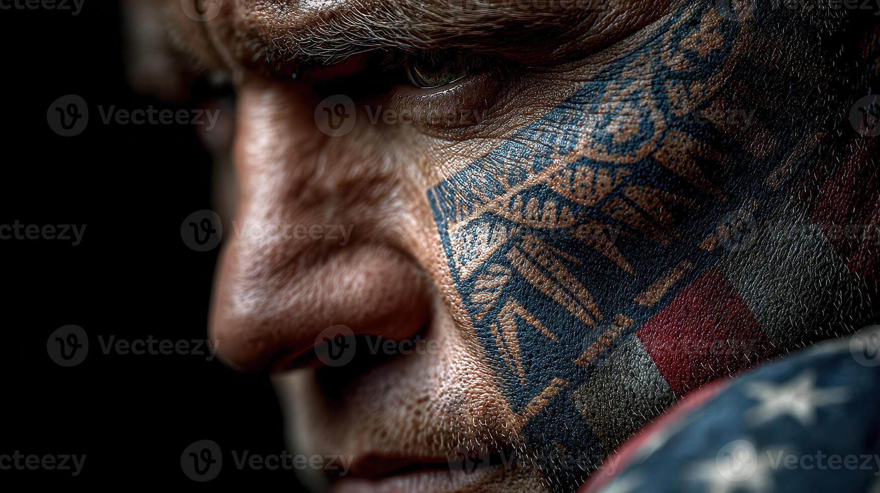 Intense close-up of a tattooed fighter showcasing cultural art and determination ahead of a match photo