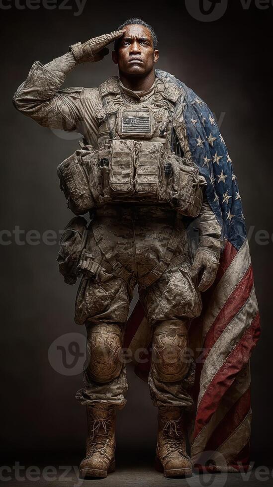 Saluting soldier wearing military gear with an American flag draped behind in a solemn tribute during a military recognition event photo