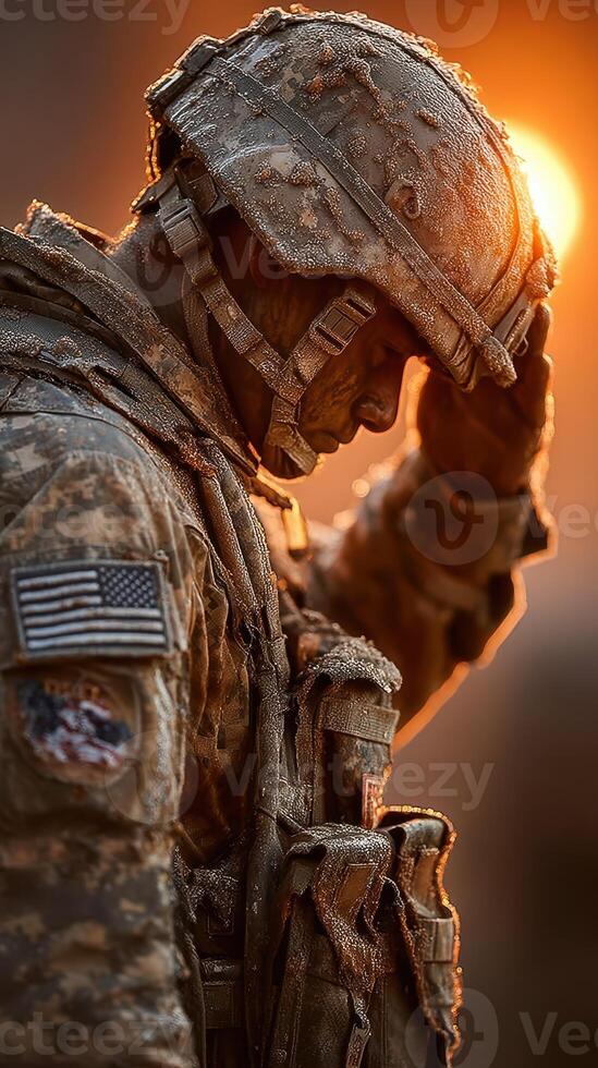 Soldier paying respect during sunrise in a frosty environment at a military training site photo