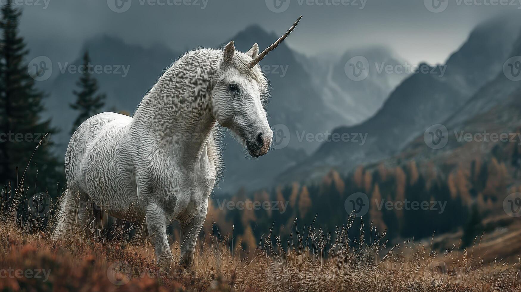 Mystical white unicorn standing majestically in a misty mountain landscape during twilight photo