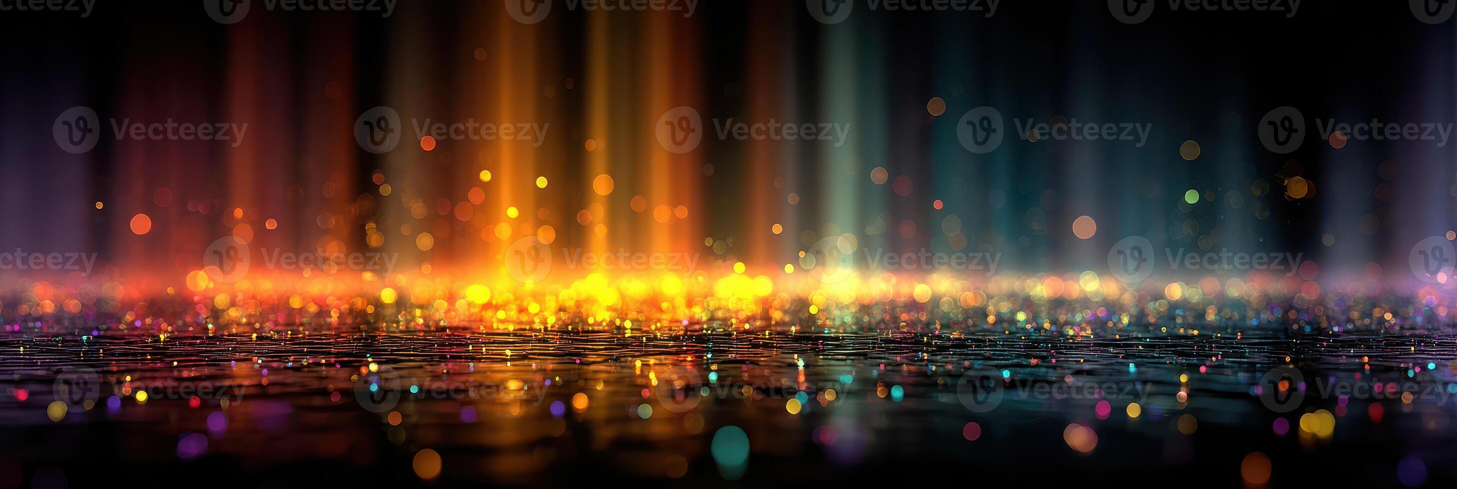 Colorful light display over wet surface creating a vibrant atmosphere during nighttime photo