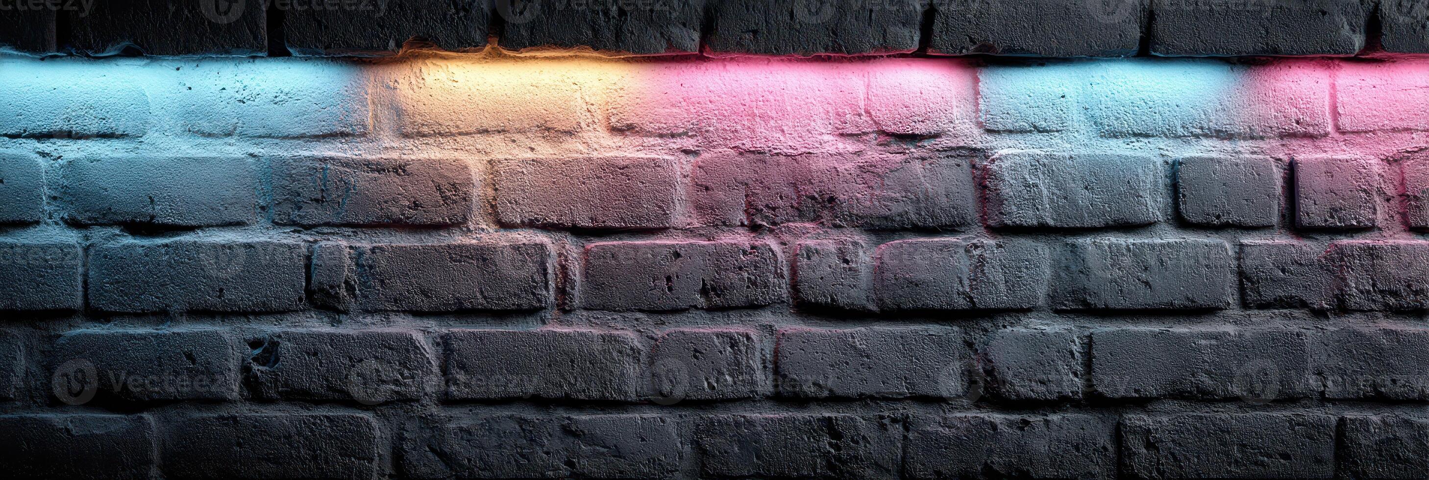 Vibrant neon lights illuminating a textured brick wall in an urban setting during nighttime hours photo