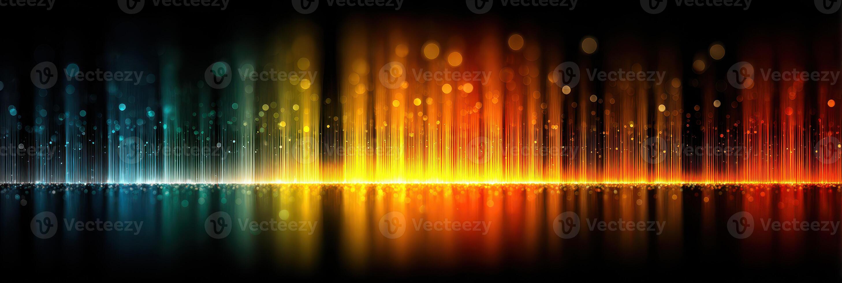 Colorful abstract light display with vibrant hues reflecting across a dark background photo