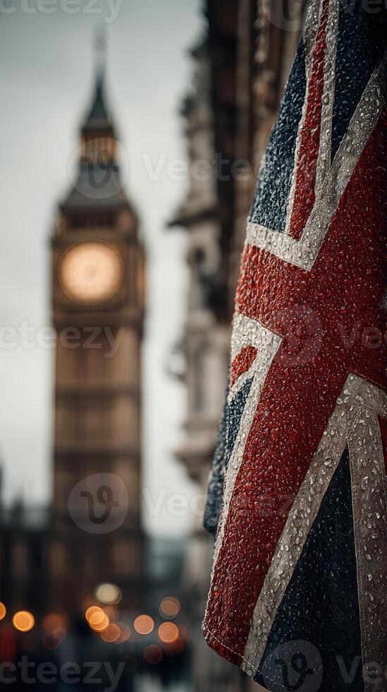 Rainy evening in London with Big Ben and a wet Union Jack flag in focus photo