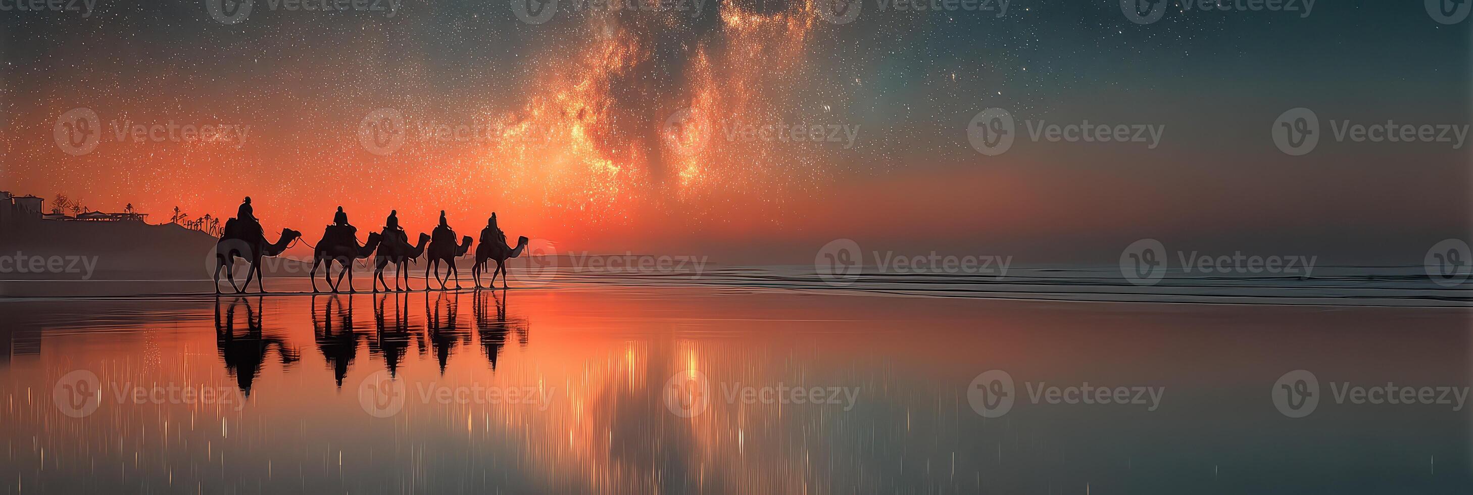 Camel caravan travels along a tranquil beach at sunset under a starry sky photo