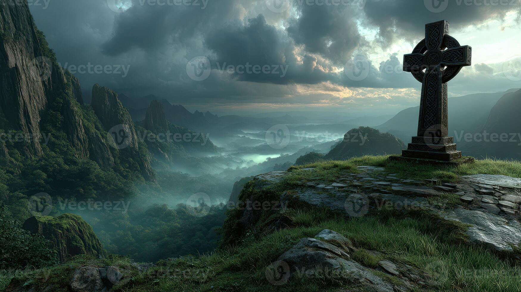 Celtic cross stands majestically on a rocky cliff overlooking misty mountains at dusk photo