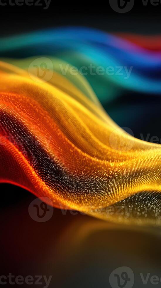 Vibrant abstract waves of color flowing smoothly across a dark background in a creative visual display of motion and light photo