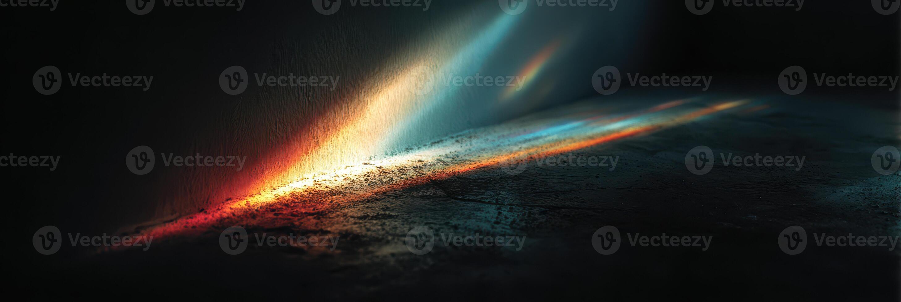 Light beams emerge from a dark corner, creating abstract patterns on a textured surface photo