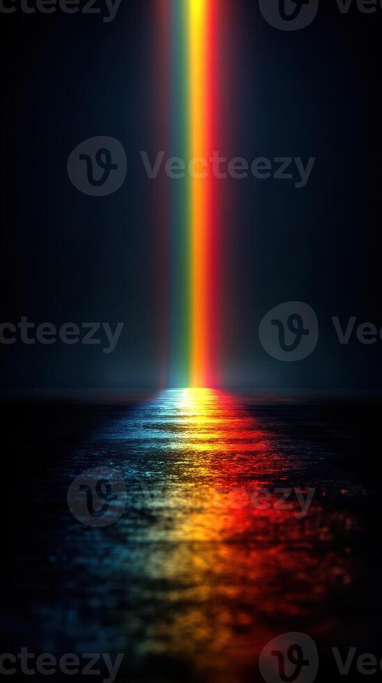 Colorful spectrum of light illuminating a dark water surface at night photo