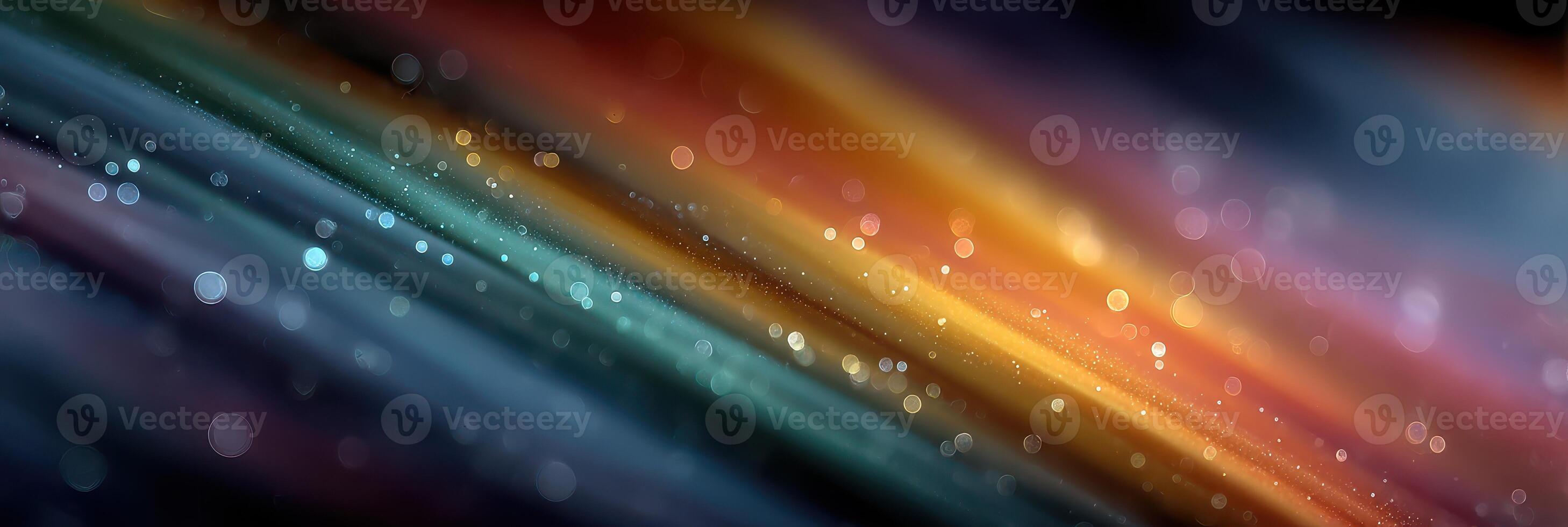 Colorful abstract background with streaks of light and shimmering particles captured in a dark setting photo