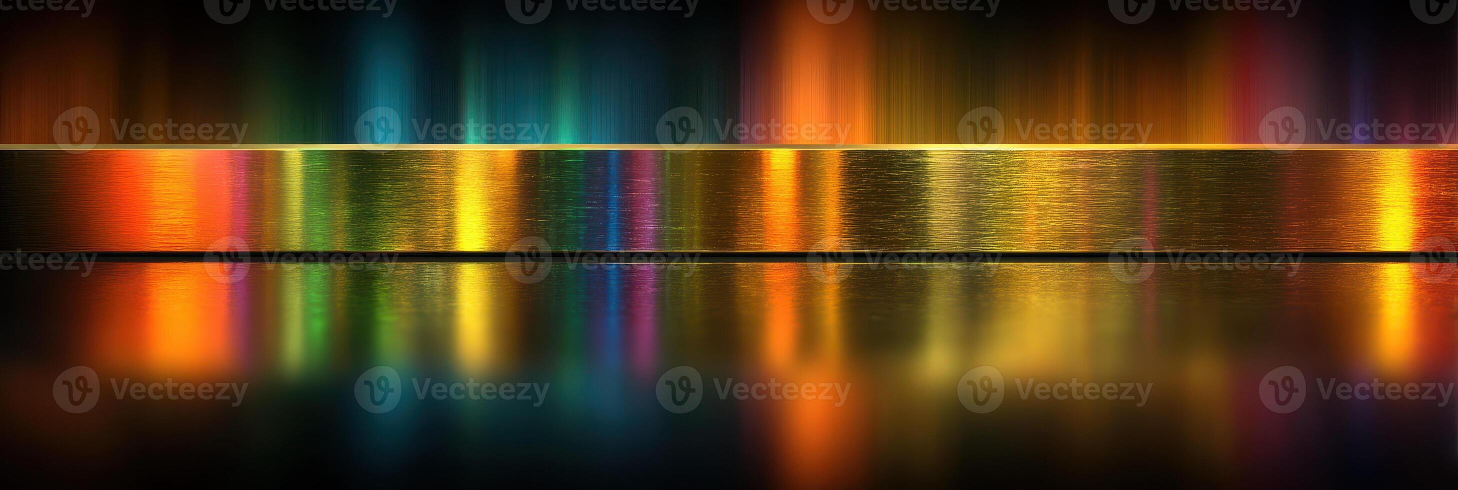 Colorful reflections on a metallic surface creating a vibrant visual display in a dimly lit environment photo