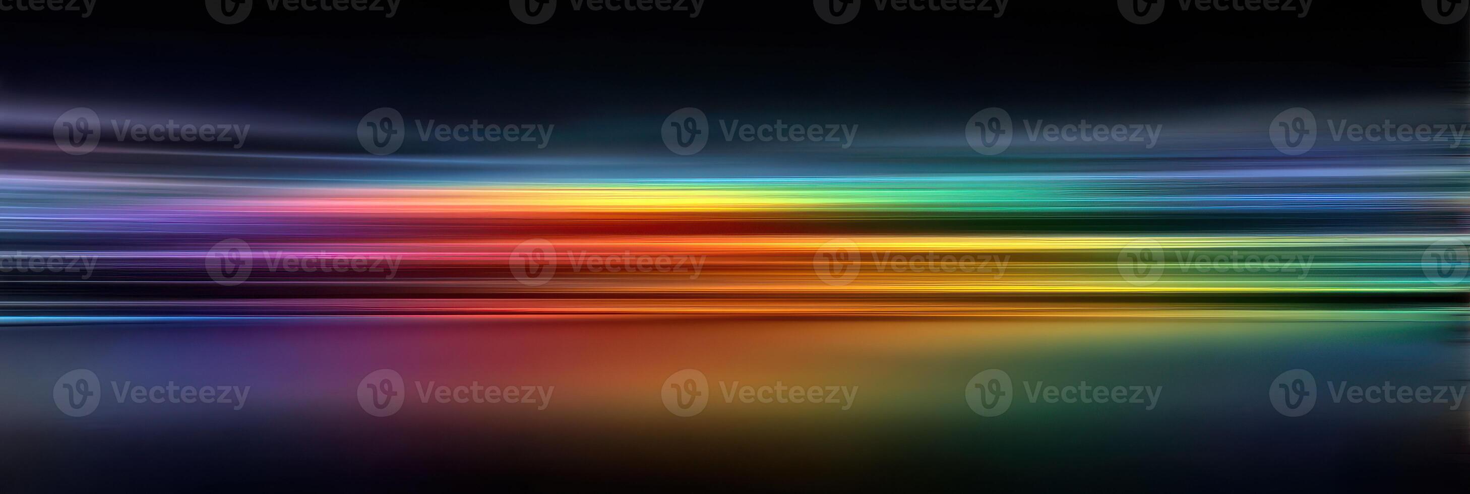 Vibrant light streaks create a colorful abstract pattern at night showcasing a blend of hues in motion photo