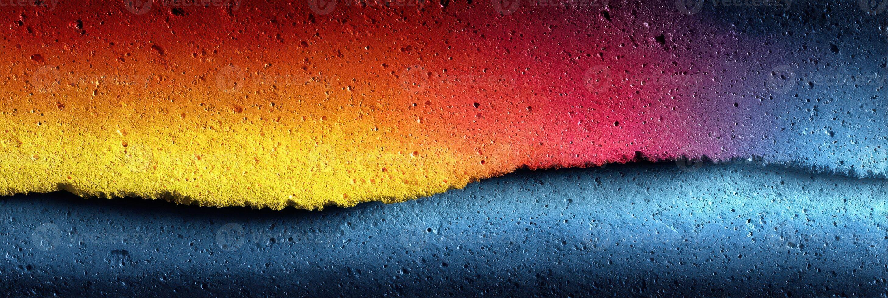 Colorful gradient surface showcases vibrant hues of red, orange, and blue in an abstract design photo