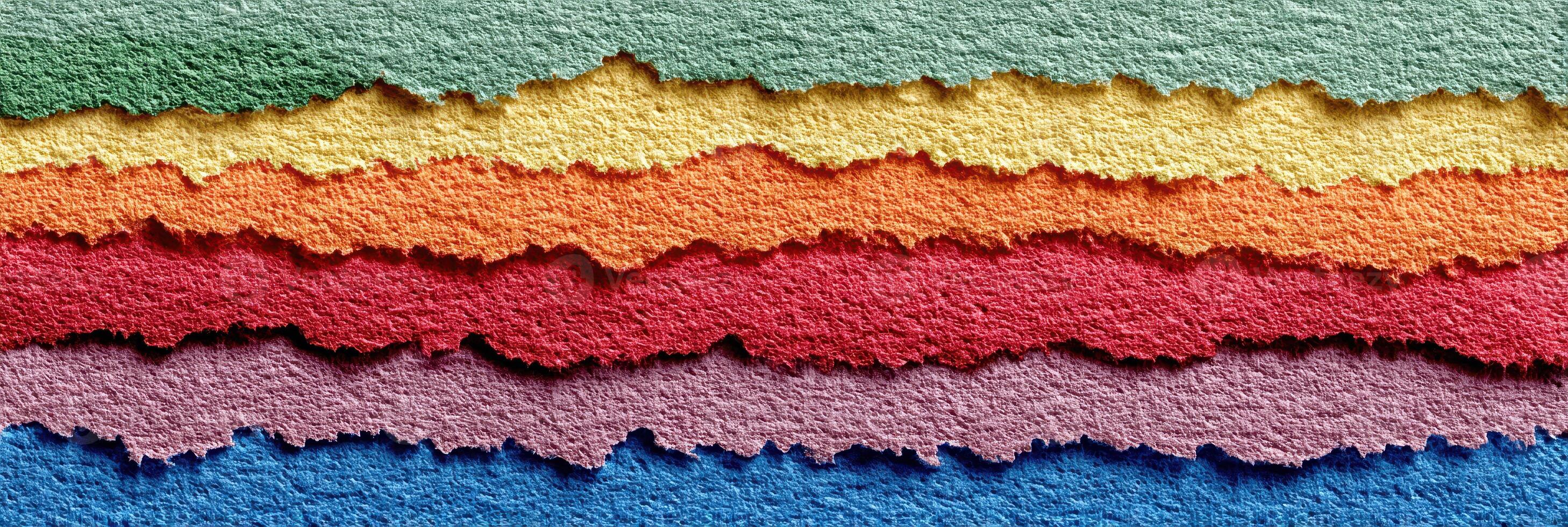 Colorful layers of textured paper create a vibrant backdrop for art and design projects photo