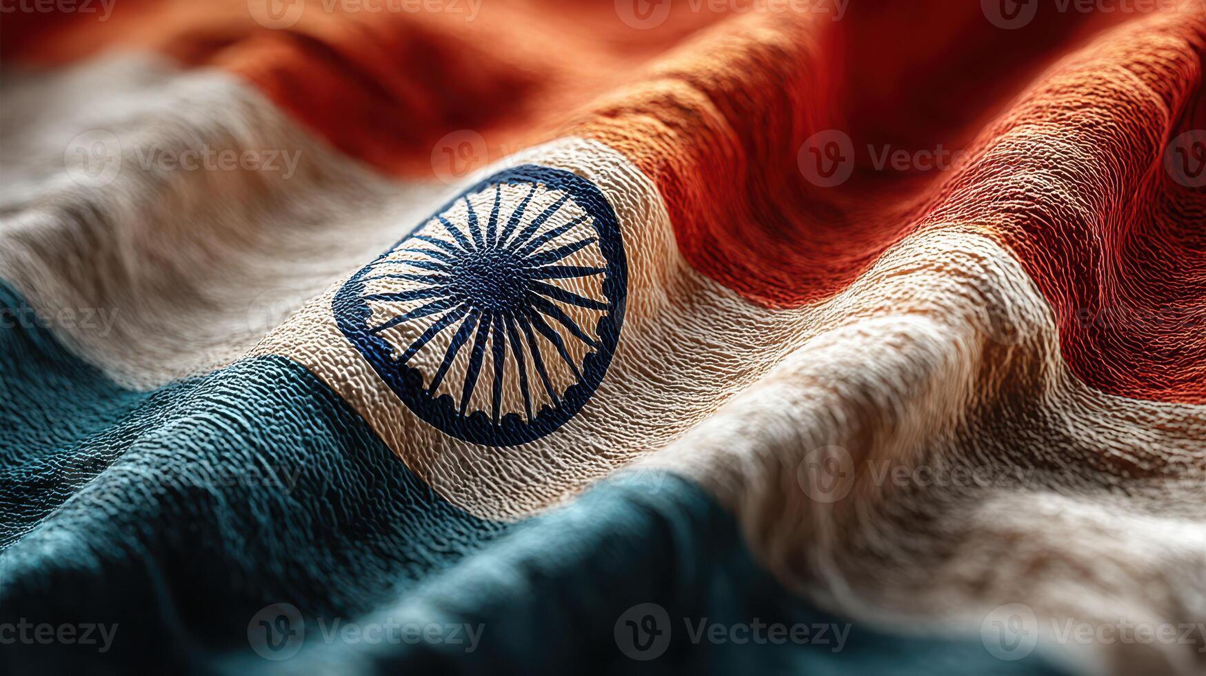 Indian flag gently waving in the breeze, showcasing orange, white, and green colors with the Ashoka Chakra in the center under natural light photo