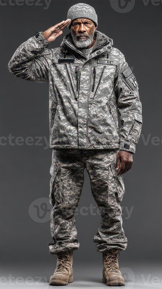 Military personnel saluting in winter camouflage uniform with beard and beanie against a dark background photo