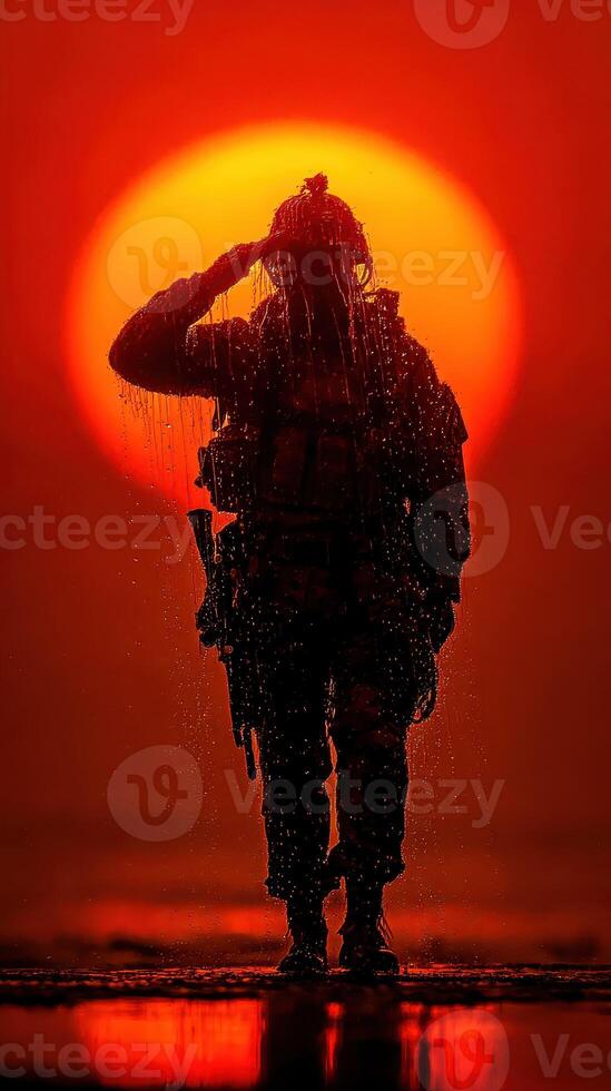 Soldier saluting at sunset with water droplets highlighting dedication and sacrifice during a quiet moment photo