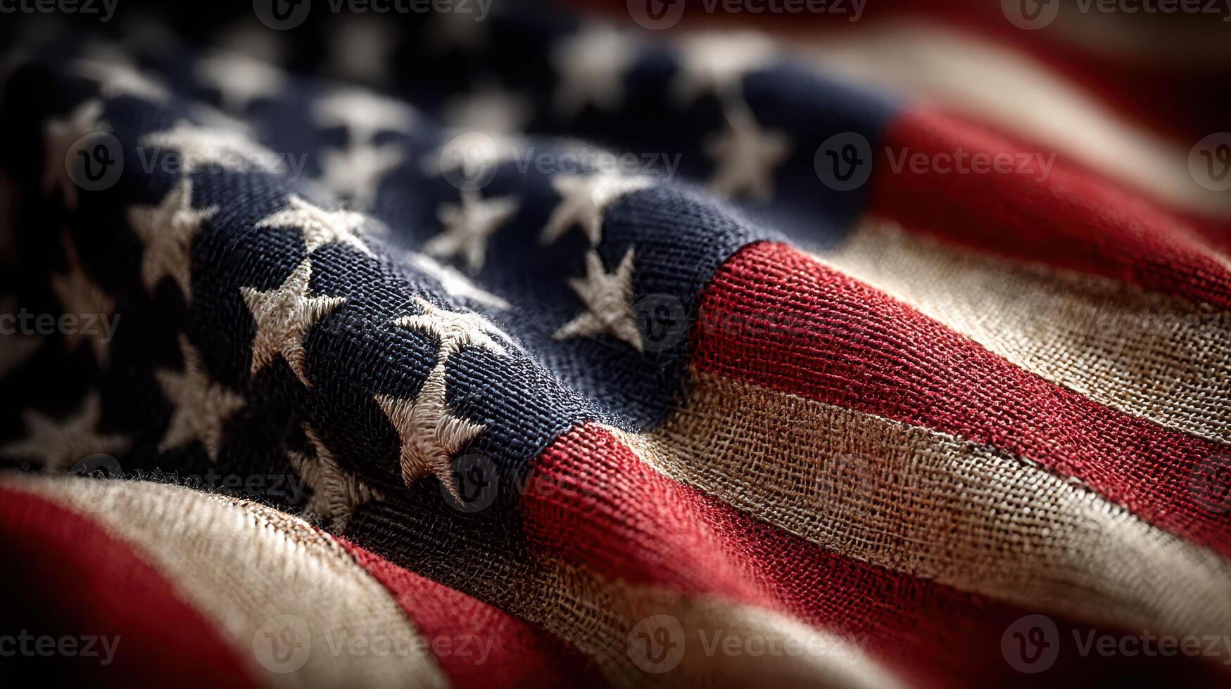 American flag displayed in detail, showcasing rich colors and textures of fabric with a focus on stars and stripes photo