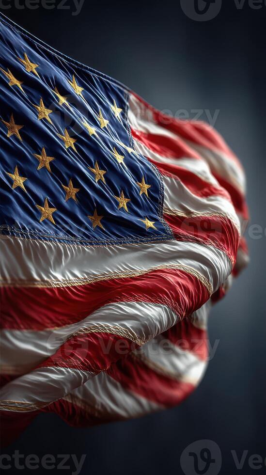United States flag waving against a dark background with prominent details highlighting its stars and stripes photo
