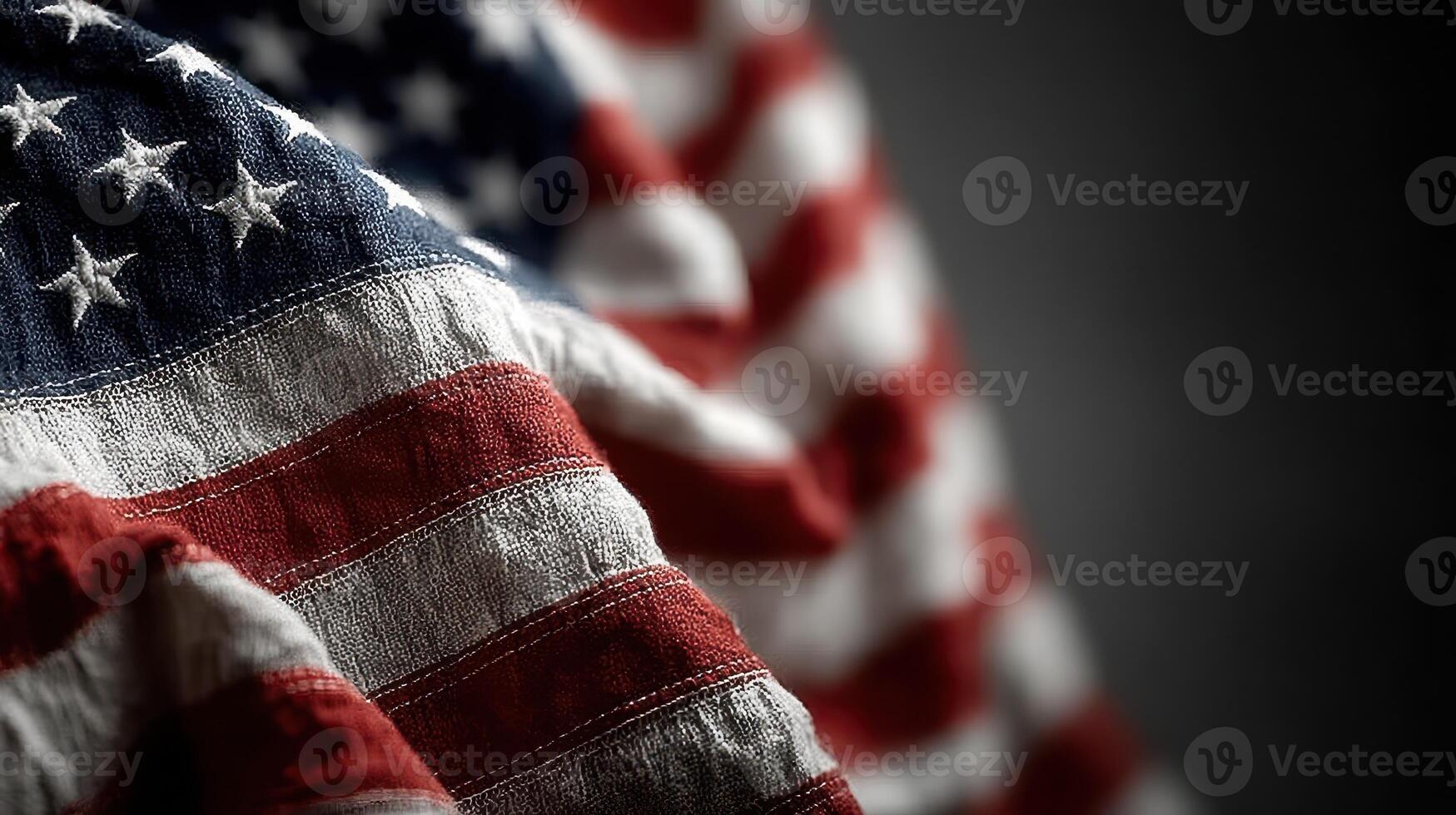 Close-up view of an American flag with intricate fabric textures in soft lighting photo