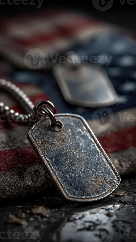 Military dog tags displayed on a worn flag, highlighting the bond between service members and their country photo