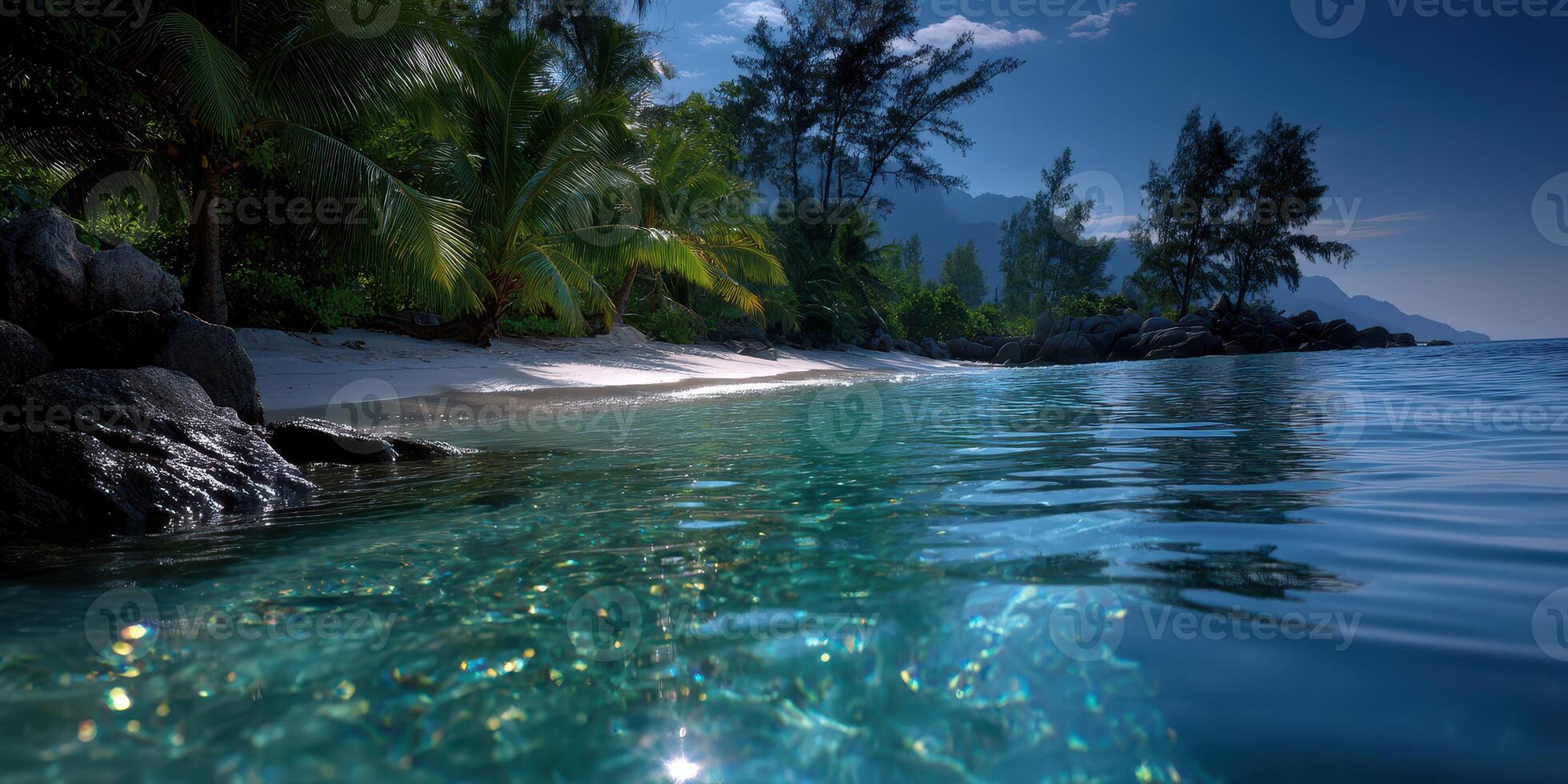 Calm turquoise waters lap gently against a tropical shoreline under a serene evening sky photo