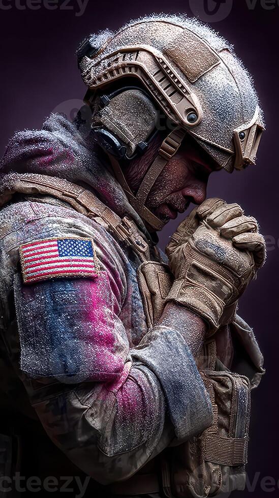 Soldier in tactical gear praying with dust and snow on uniform at a somber moment in an intense environment photo
