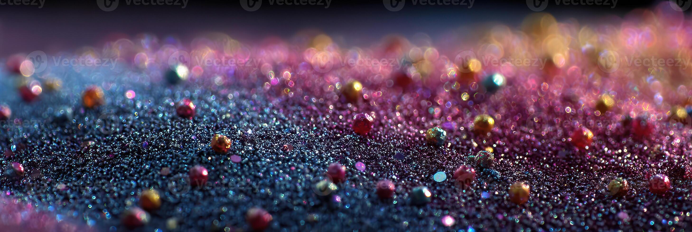 Colorful sparkling glitter spread across a dark surface creating a vibrant and dazzling effect photo