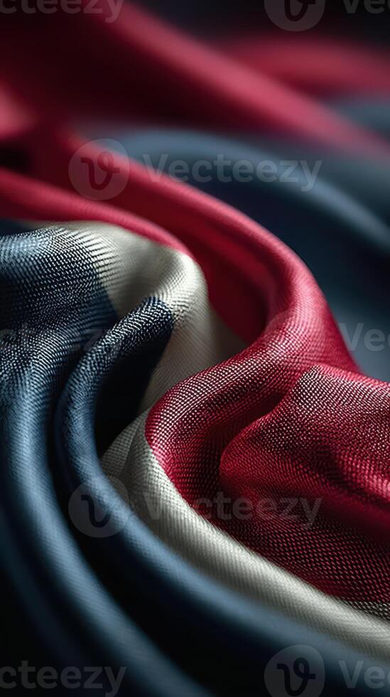 Vibrant folds of a fabric featuring the colors of the national flag close-up at afternoon light photo