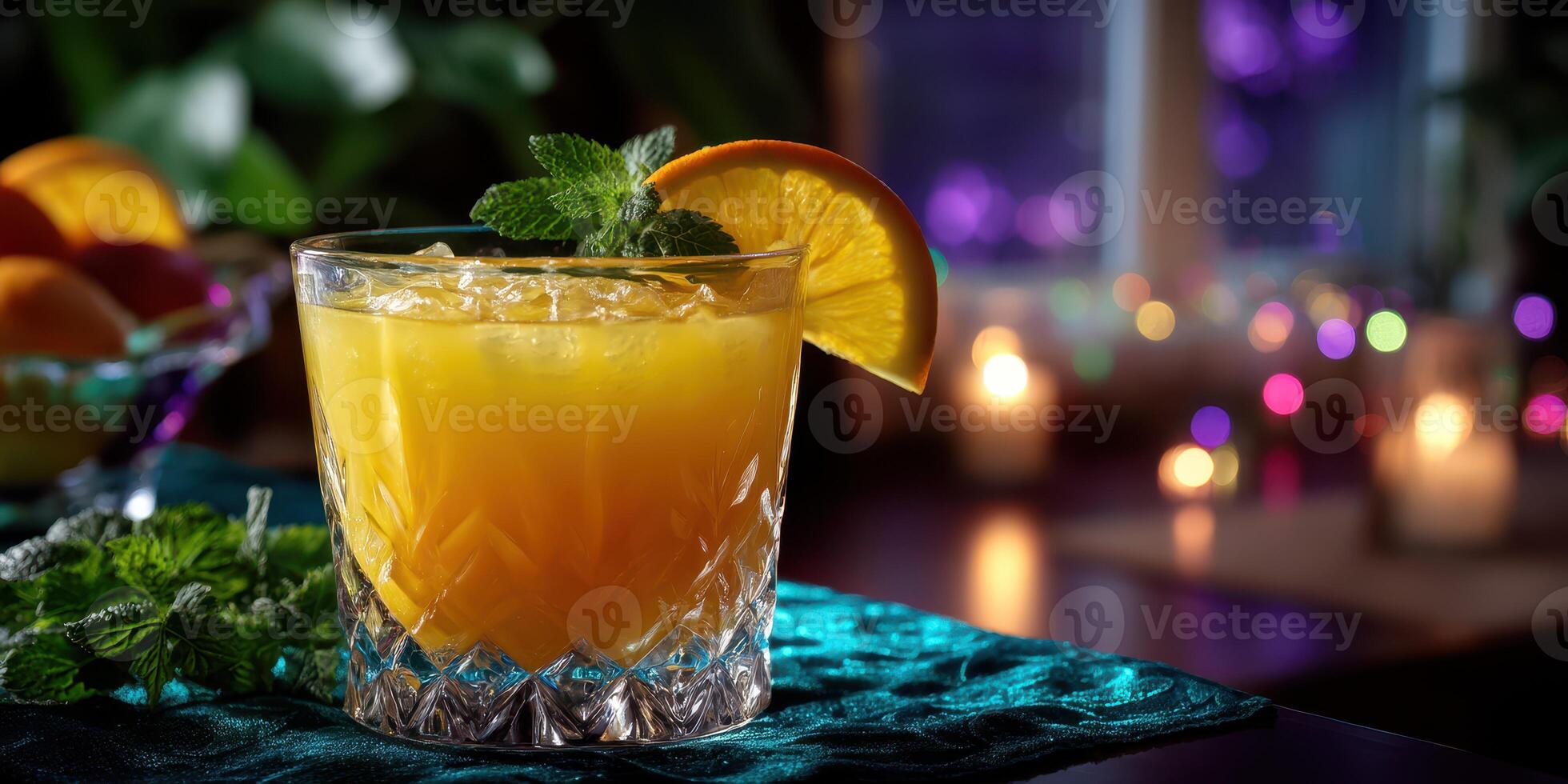 Bright citrus cocktail served in a glass with garnishes on a vibrant table setting at a cozy evening gathering photo