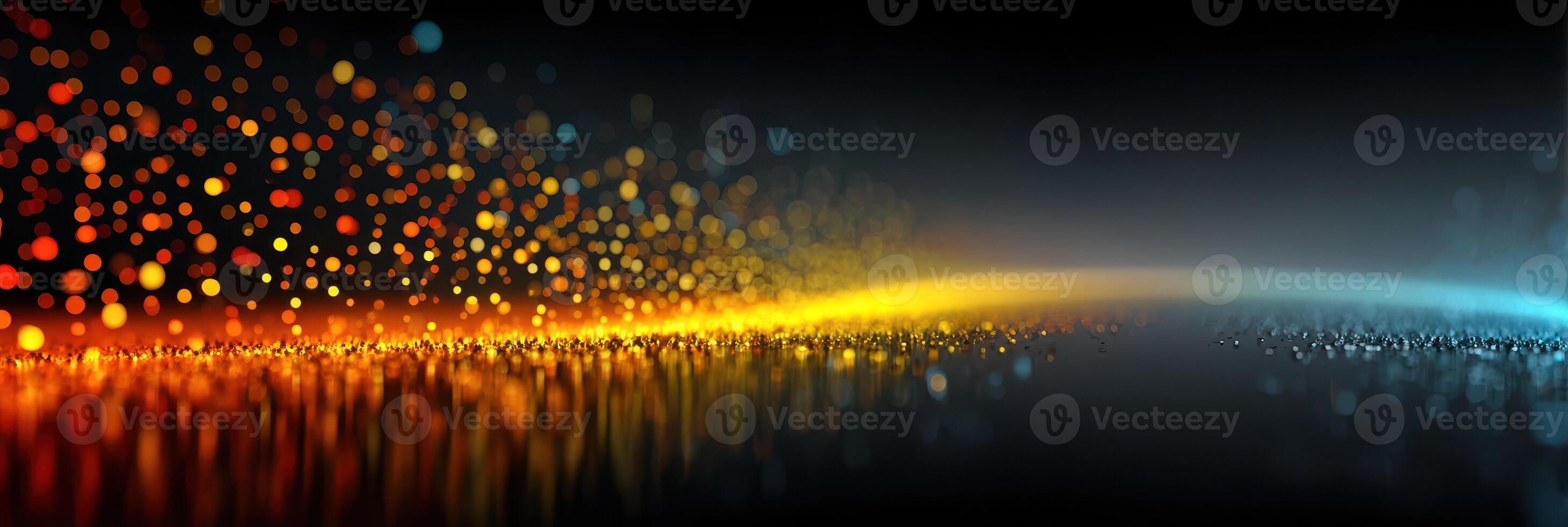Vibrant light particles create a stunning gradient effect in a dark setting during nighttime photo