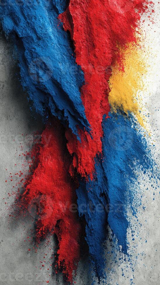 Colorful powdered pigments create a vibrant texture on a gray surface during an artistic project photo
