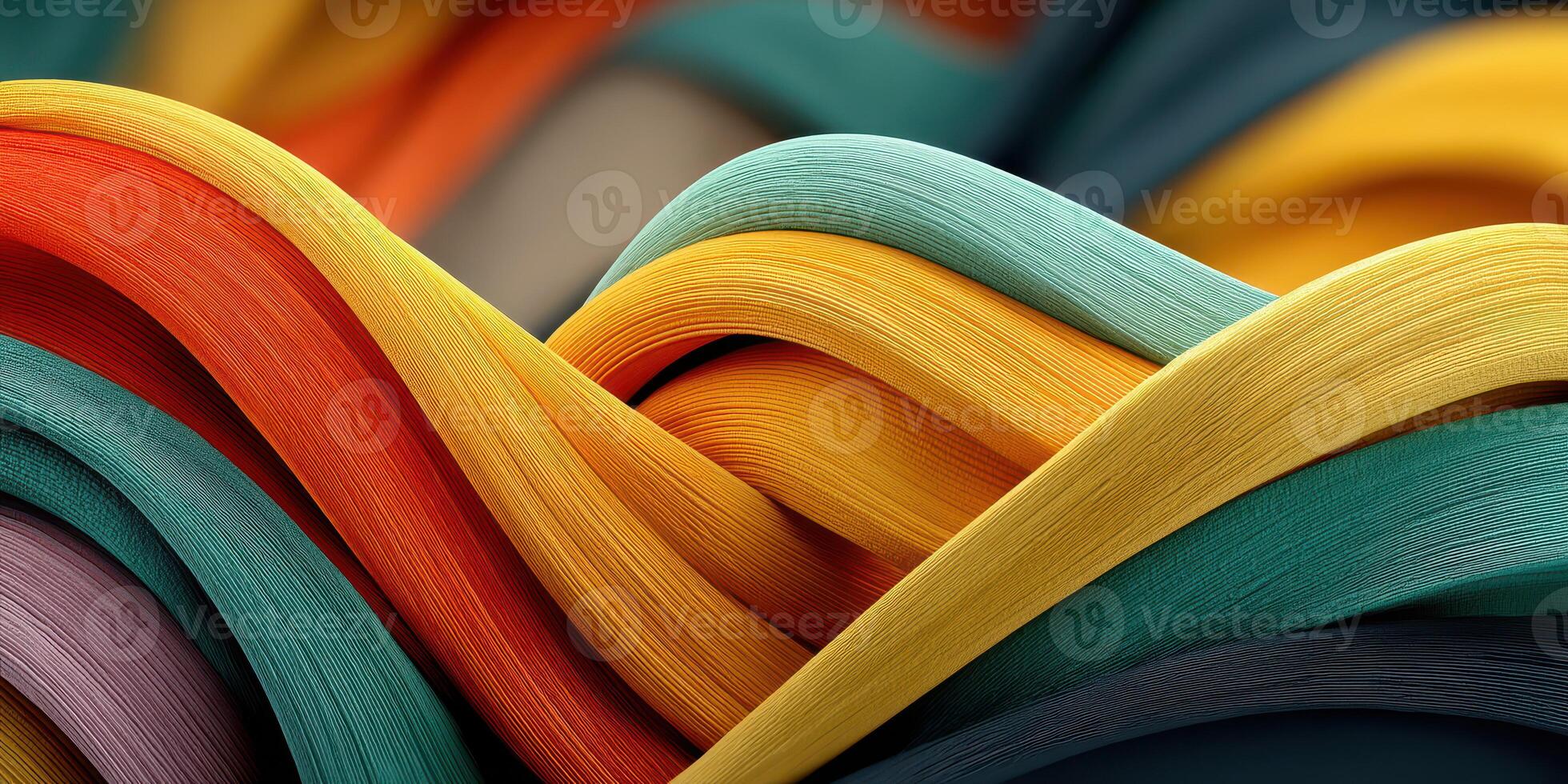 Colorful waves of ribbon material creating a dynamic visual display in a studio setting photo
