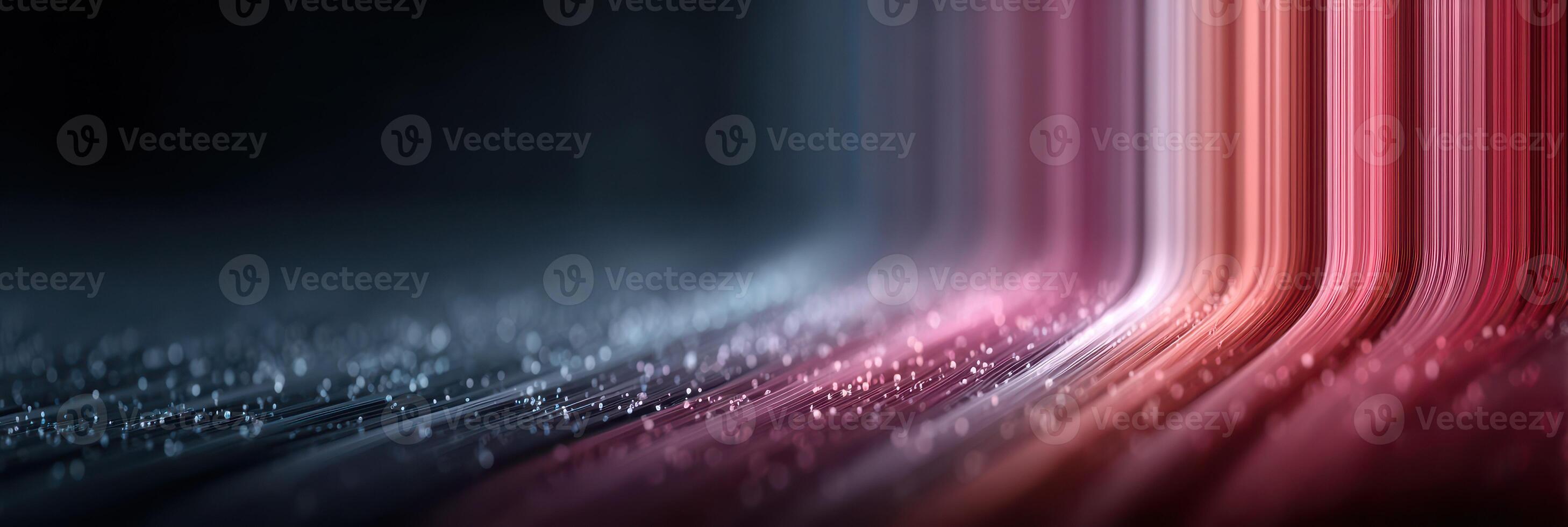 Vibrant light waves and droplets create an abstract visual experience in a dark setting photo