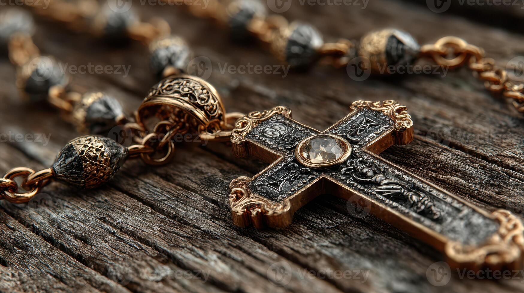 Intricate golden cross pendant rests on weathered wooden surface showcasing fine artistry and historical craftsmanship photo