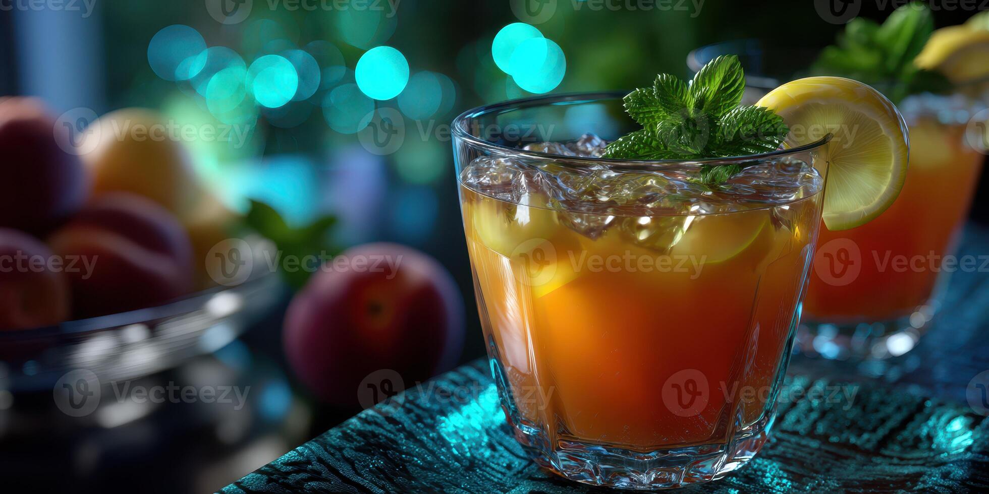 Refreshing cocktail served with mint and lemon in an elegant setting during a summer evening gathering photo