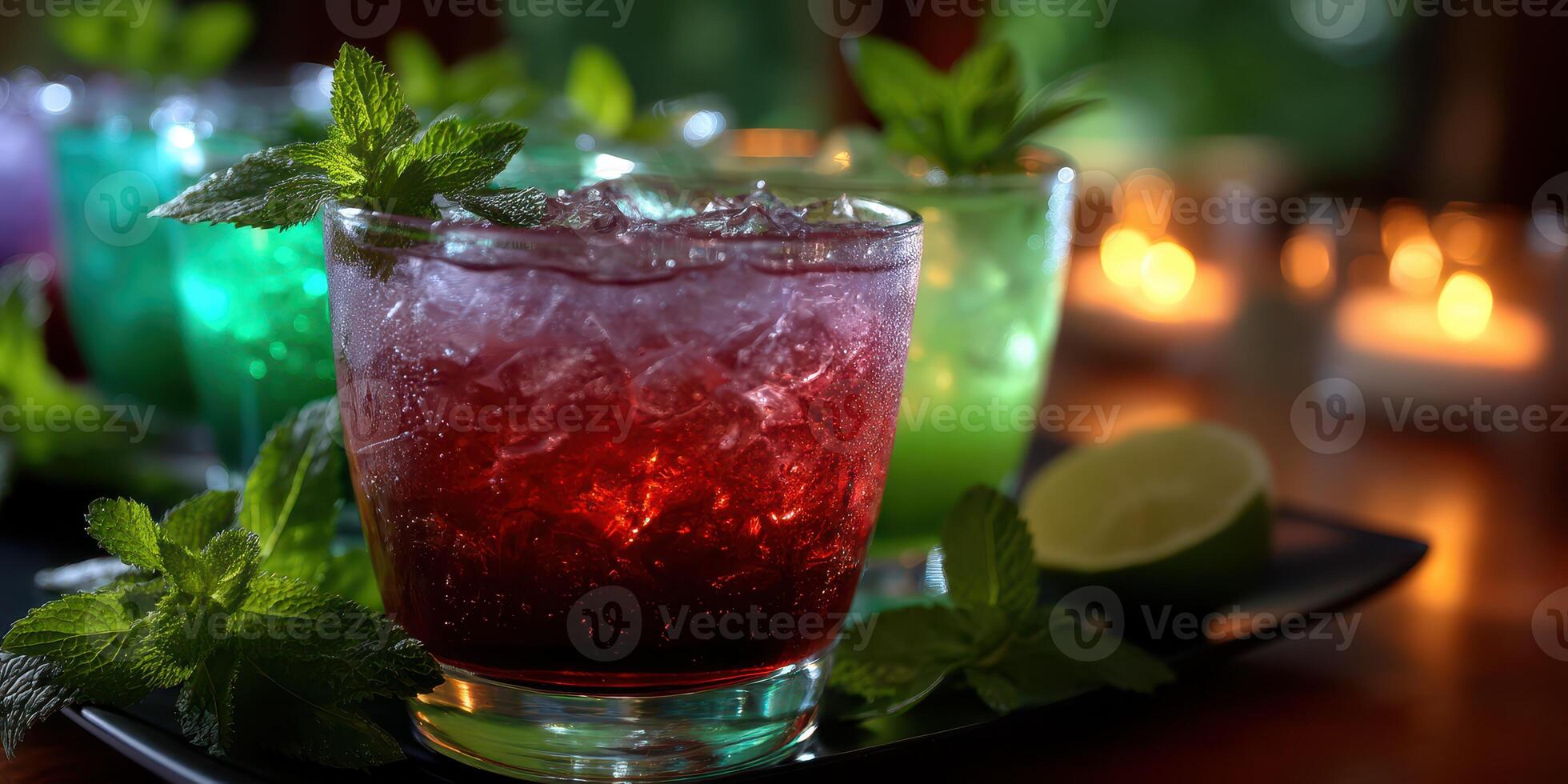 Colorful cocktails with mint and lime arranged on a table during a summer gathering in a garden setting photo