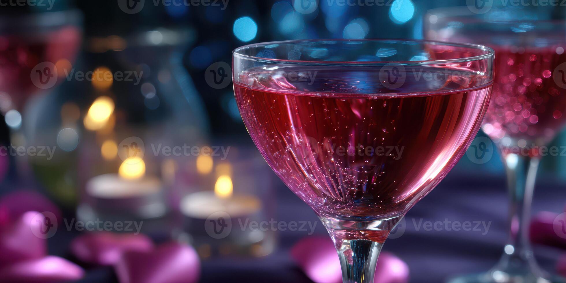Elegant cocktails with pink hue shine at a romantic evening gathering with soft candlelight glow photo