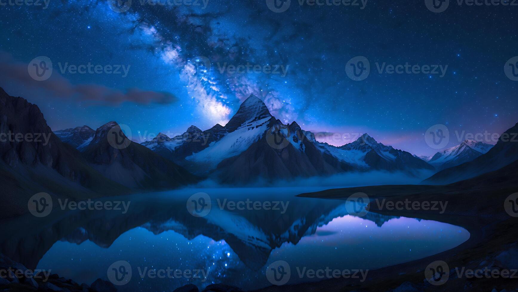 Stunning Mountain Reflection in Lake Under a Starry Night Sky photo