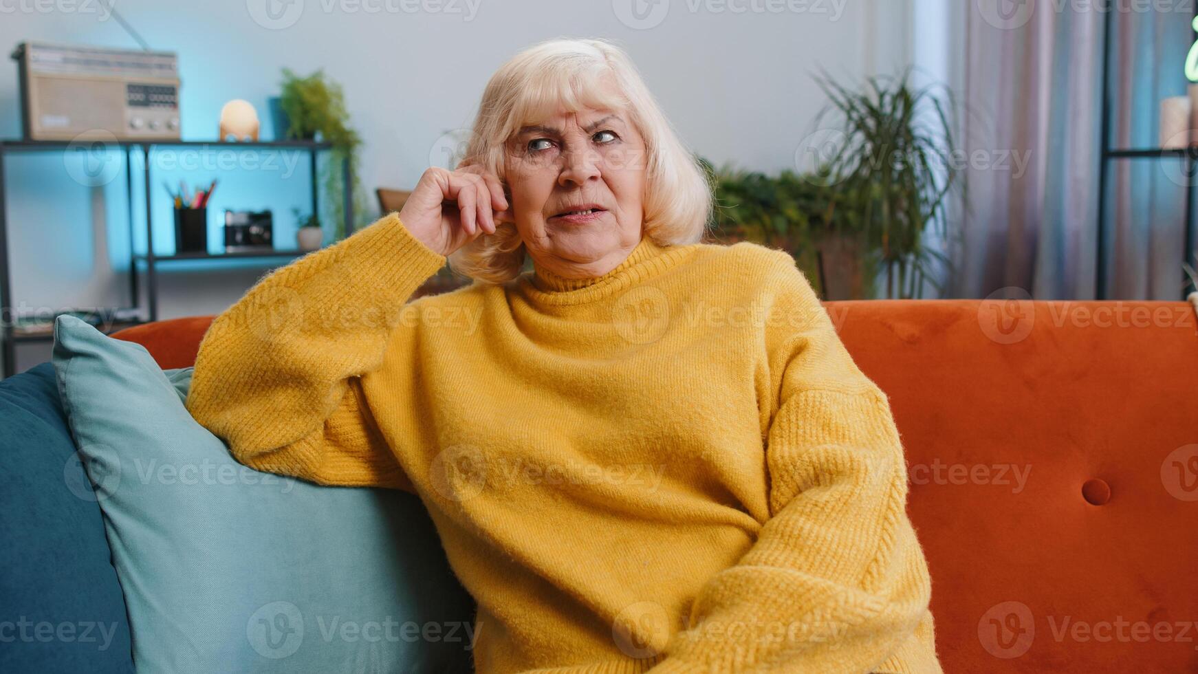 Sad lonely senior woman at home suffers from bankruptcy, sick, depressed feeling bad burnout, crisis photo