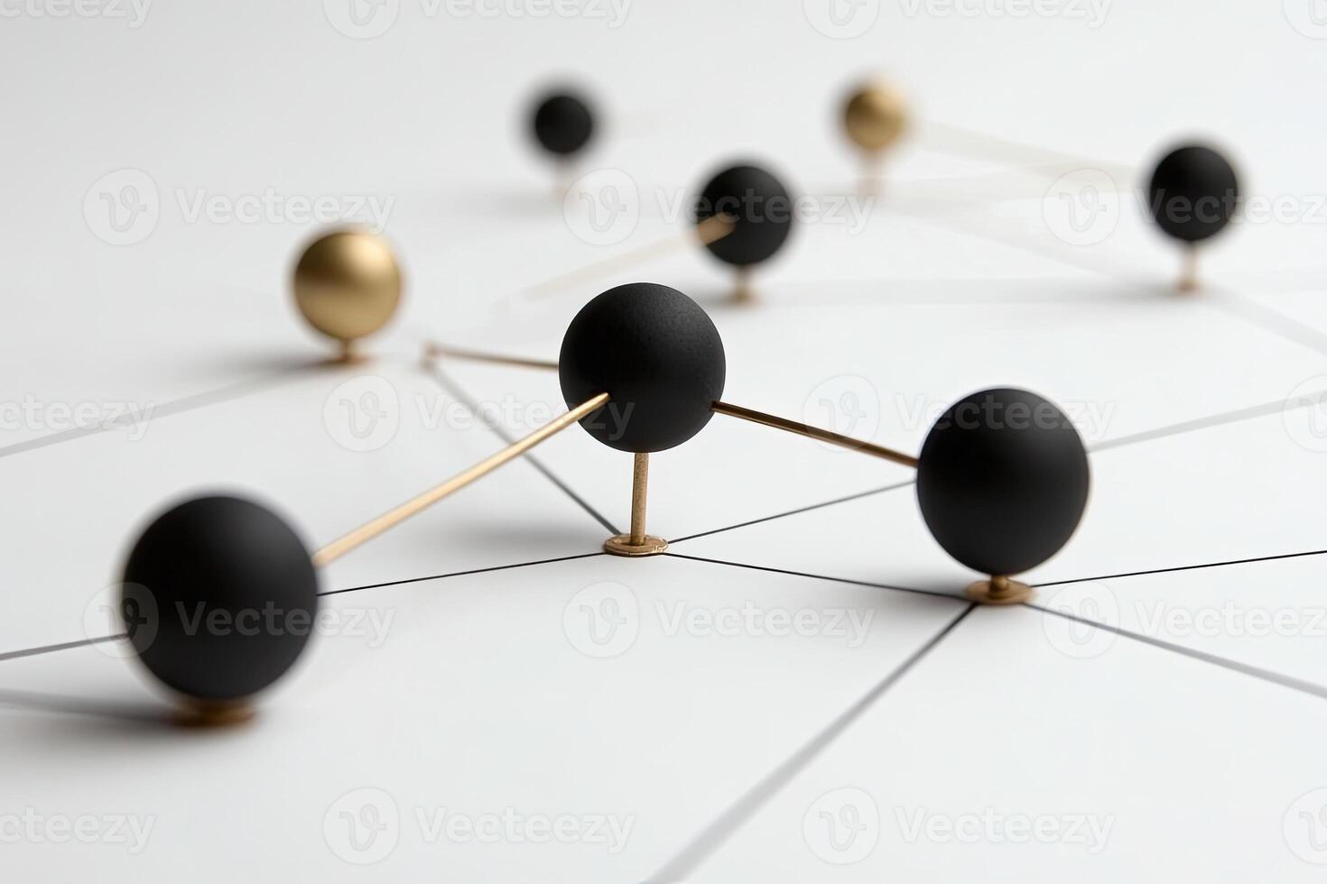A group of black balls connected to each other photo