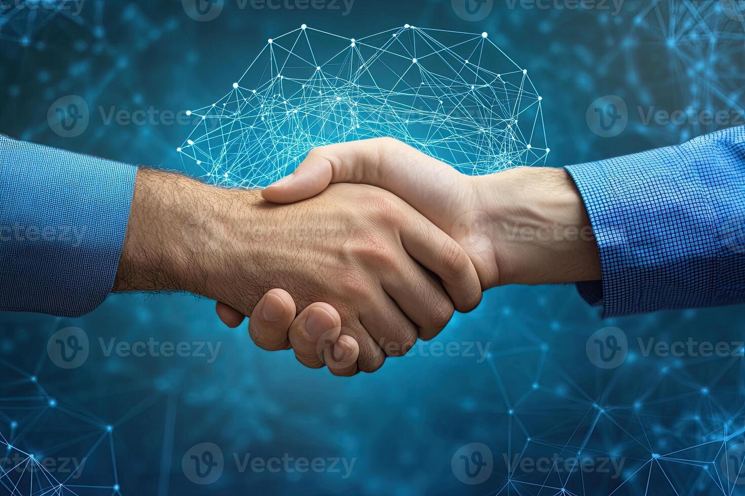 Business people shaking hands over networked background photo