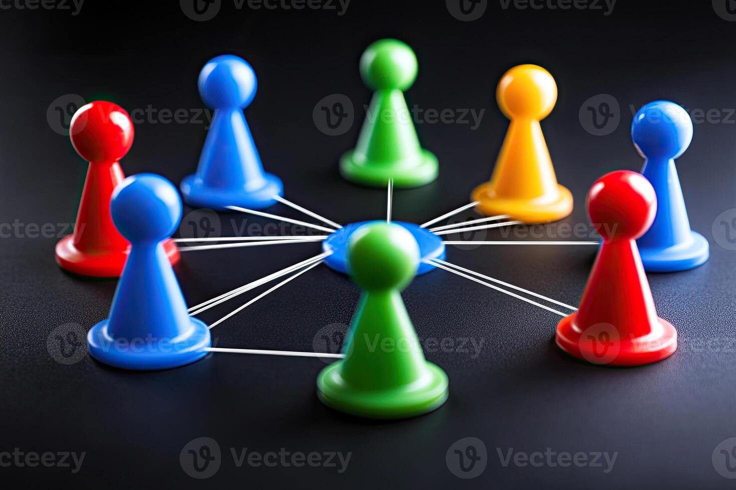 Colorful game pieces connected by threads, forming a network photo