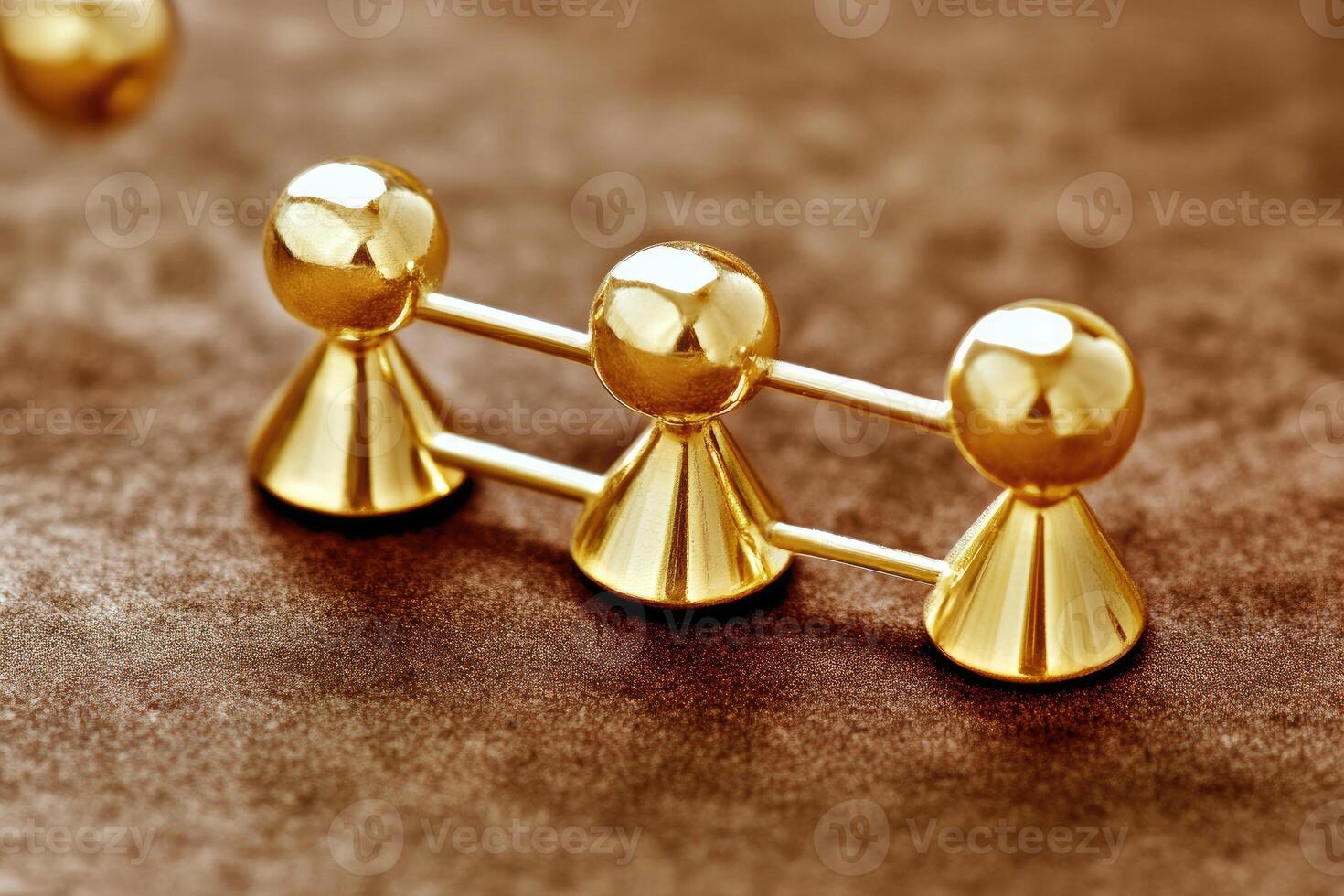 Gold figures linked in a row photo