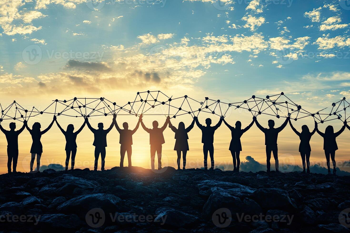 Teamwork, interconnected. Silhouette of people holding network connecting them, a symbol of collaboration photo