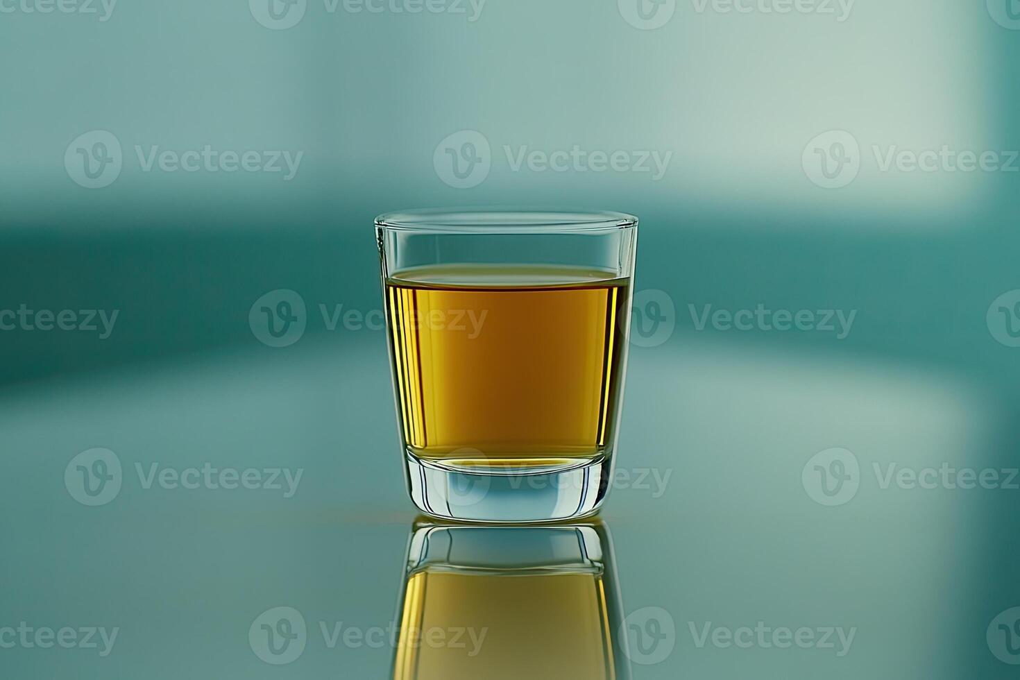 Amber liquid in a shot glass photo