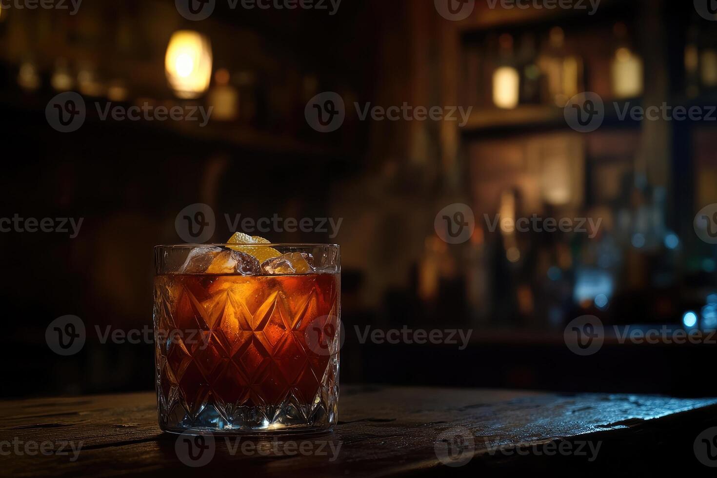 Dark amber cocktail in a crystal glass, garnished with citrus, on a rustic bar photo